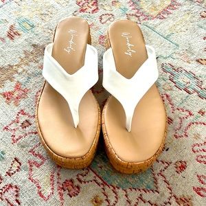 White wedge thong sandals great condition.  Worn once, smoke free home.